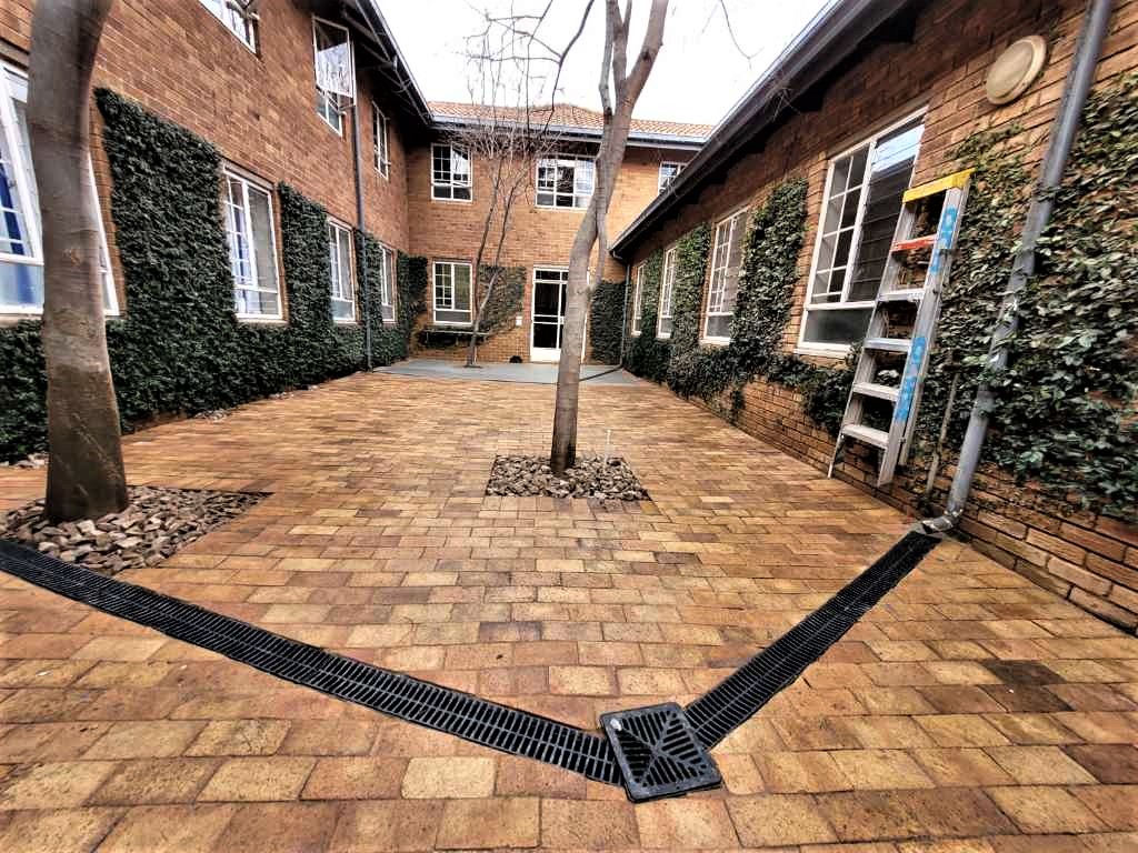 St. Albans College In Lynnwood Repurposed Old Pavers For Artificial Grass