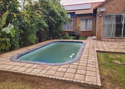 Equestria Residential Swimming Pool And Courtyard Paved