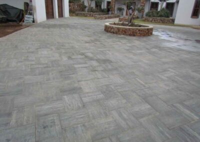 Irene Residential House Driveway With Urban Large Flagstones Packed In A Herringbone Style
