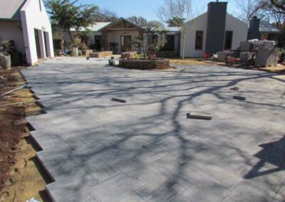 Irene Residential House Driveway With Urban Large Flagstones Packed In A Herringbone Style 6