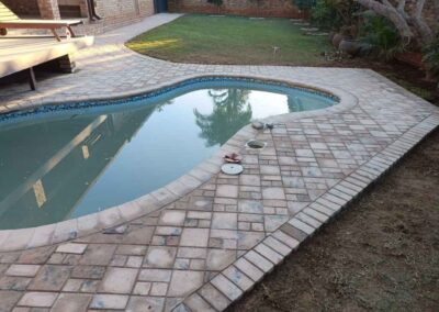 Montana Park Residential Swimming Pool Paving Using A Mix Of Various Wetcast Pavers