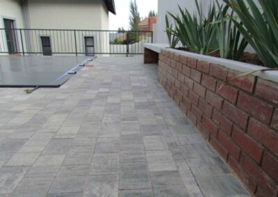 Rietvlei Heights Estate Swimming Pool Paving Granite Pavers Laid In A Stretcher Bond 2