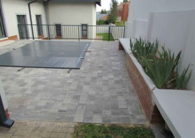 Rietvlei Heights Estate Swimming Pool Paving Granite Pavers Laid In A Stretcher Bond