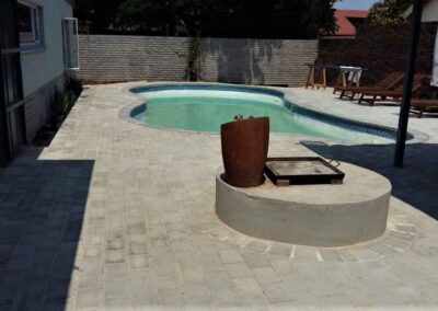 Garsfontein Residential Swimming Pool &Amp; Surroundings Paved In A Strecherbond Packing Style