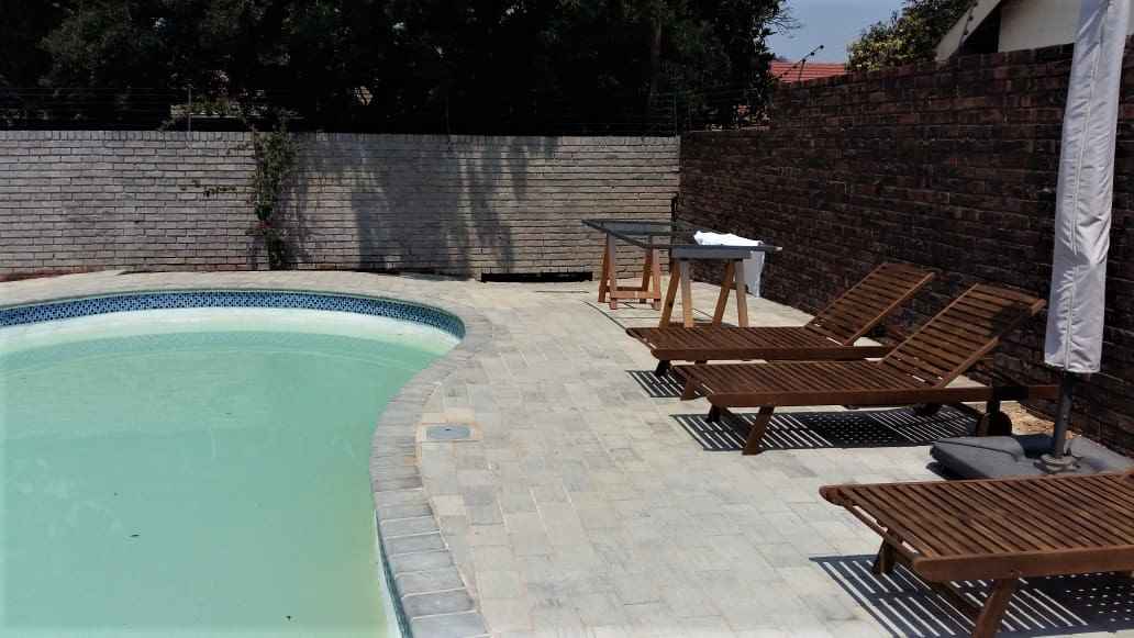 Garsfontein Residential Swimming Pool & Surroundings Paved In a Strecherbond Packing Style